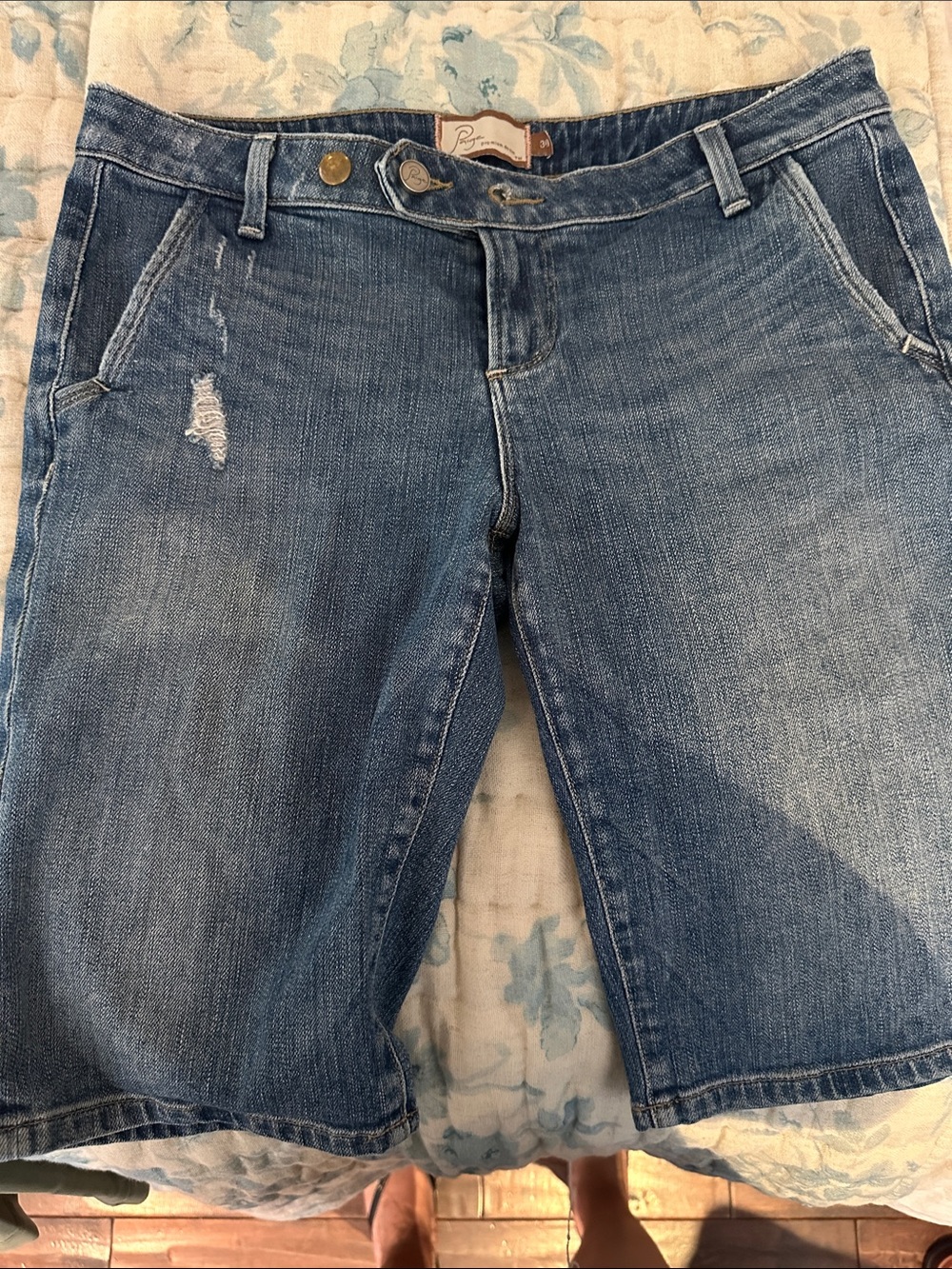 PAIGE Distressed Mid-Rise Women's Denim Shorts in Faded Blue
